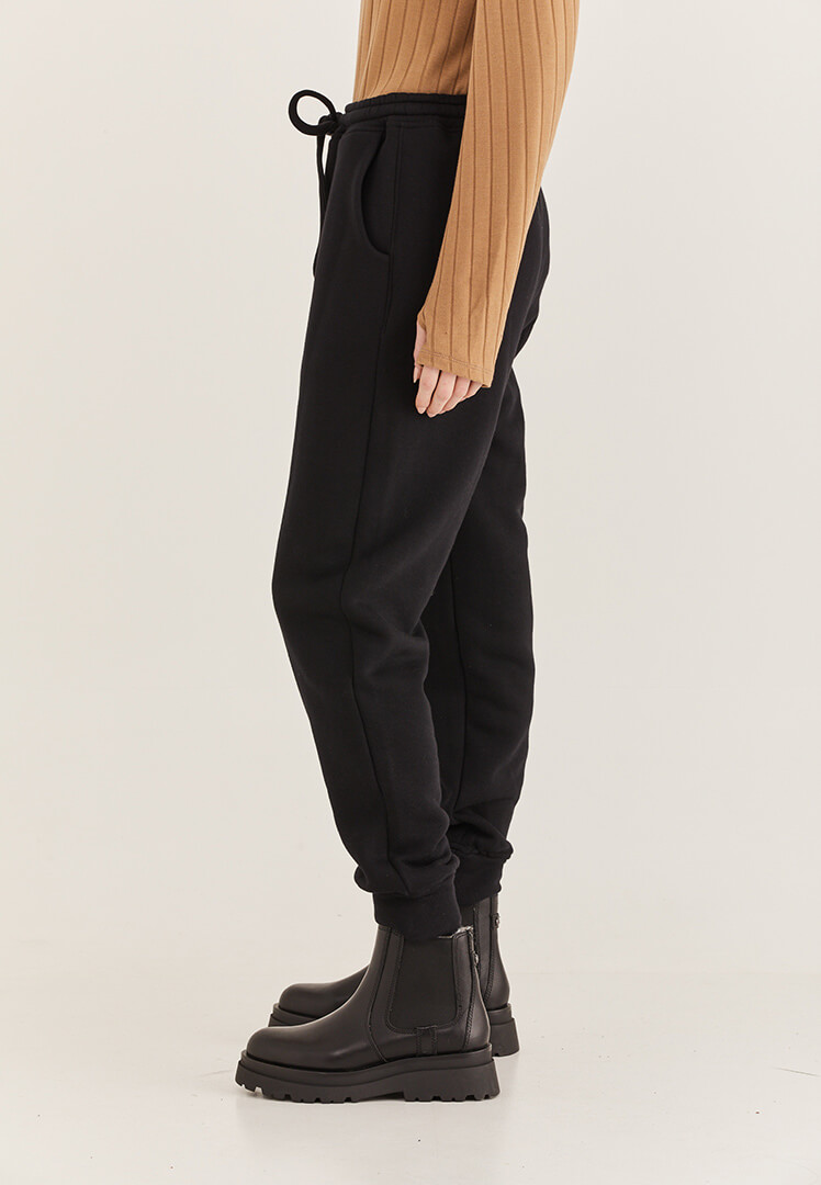 מכנסי גומי סנדרו בצבע שחור - טוטון